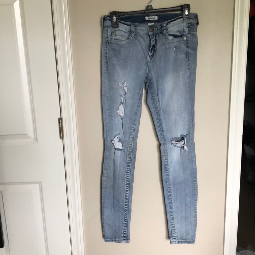 Light wash distressed skinny jeans